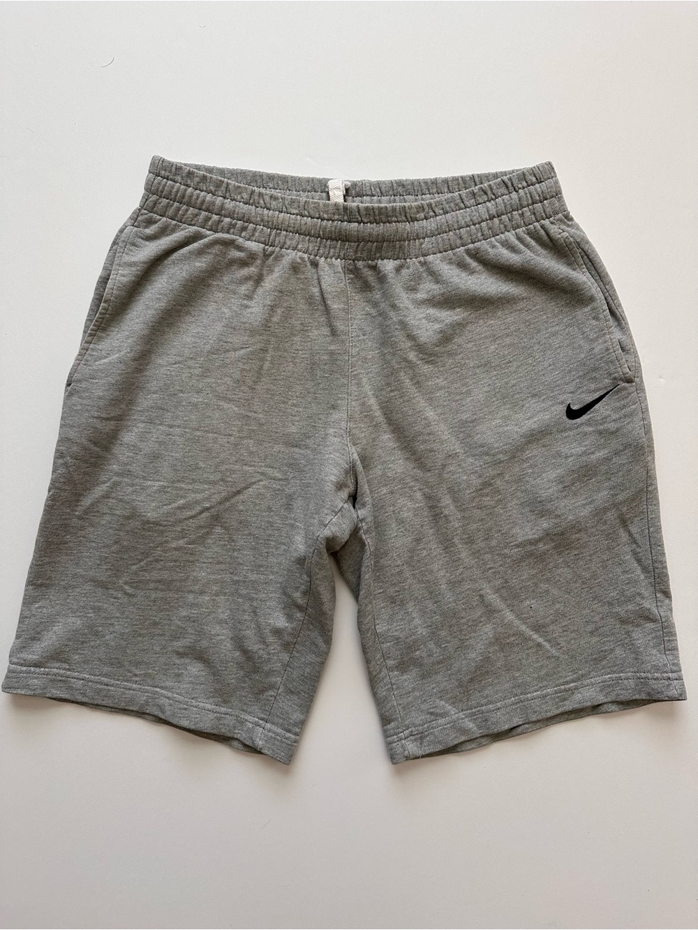 Nike Men's Light Gray Athletic Shorts with Black Swoosh